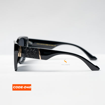 Louis Vuitton CODE-D40 sunglasses, showcasing a sleek, modern design with the iconic LV logo.

